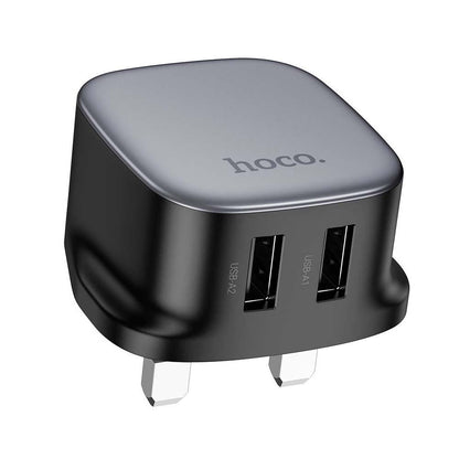 Hoco CS31B Ray dual-port USB wall charger with a UK plug configuration